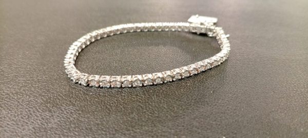 Gold ladies bracelet  with 0.80CT diamonds and white gold platting gold weight 11.890 grams